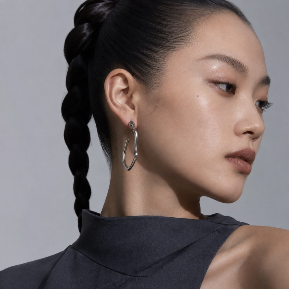 Sculptural Wide Hoop Earrings — model view 1