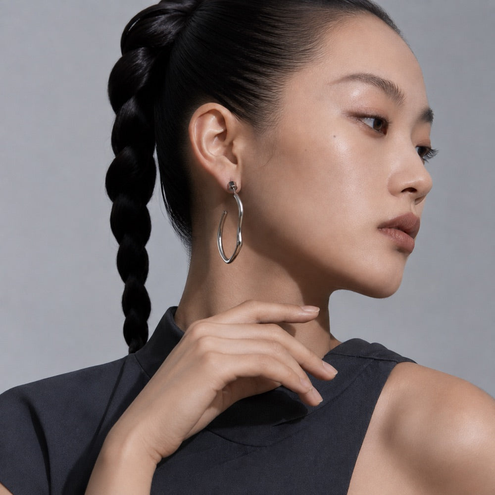 Sculptural Wide Hoop Earrings — model view 3