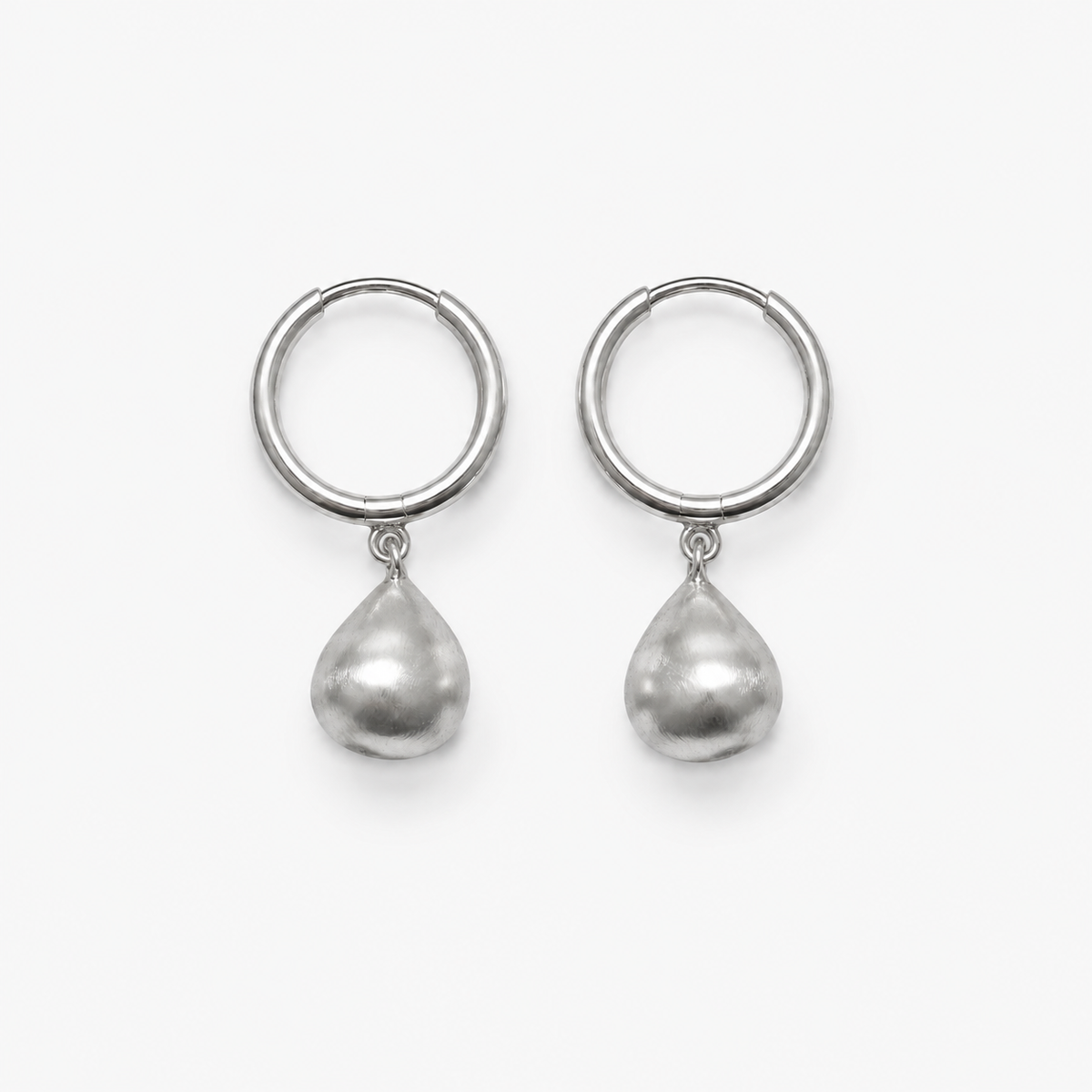 Whisper Earrings — light neutral background with natural shadow
