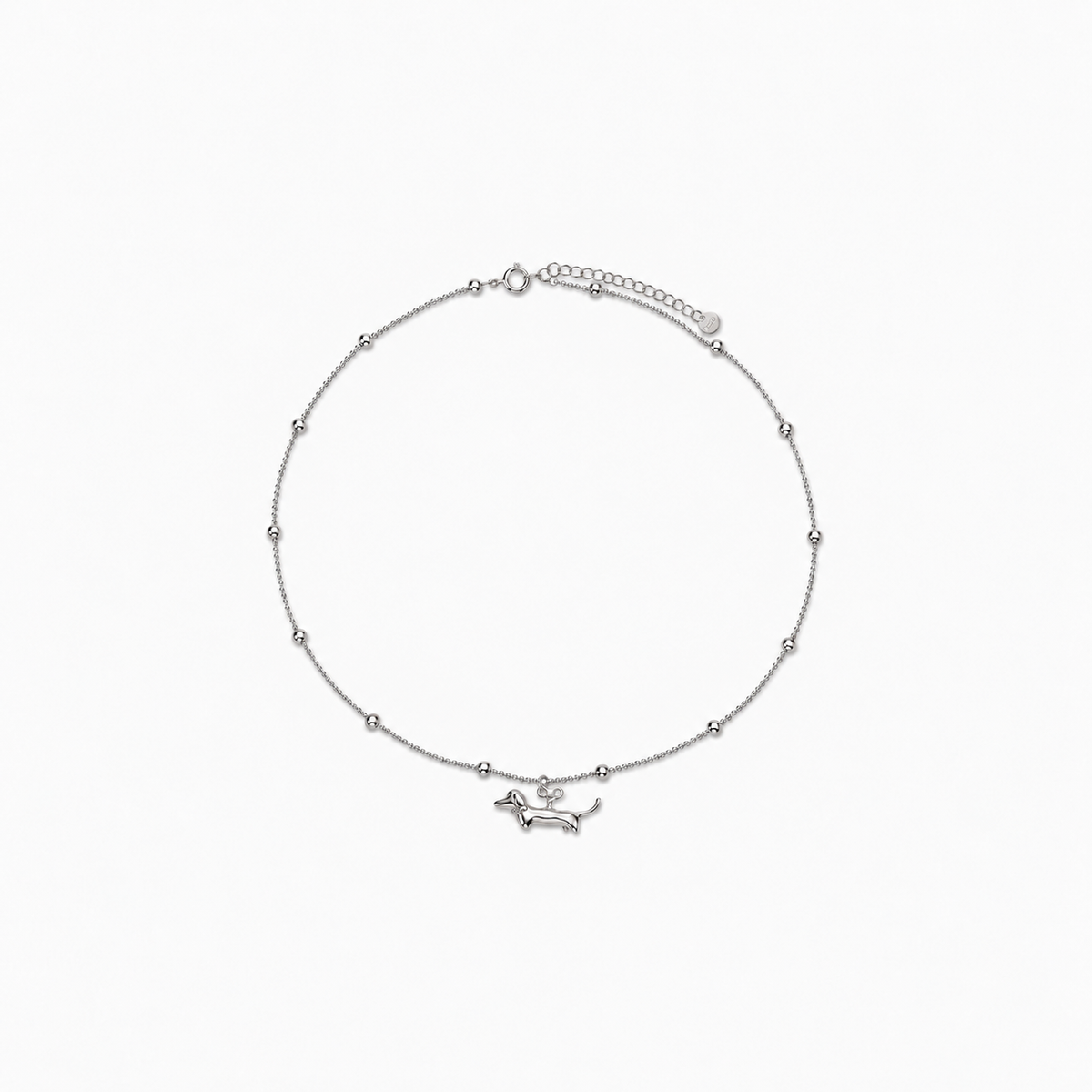 Afterlight Necklace — light neutral background, collection-safe framing with natural shadow