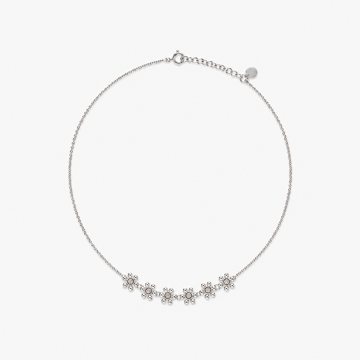 Low Tide Necklace — light neutral background with natural shadow