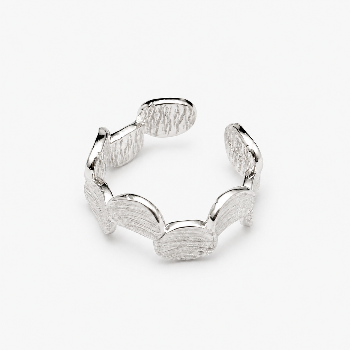 Still Point Ring — light neutral background with natural shadow