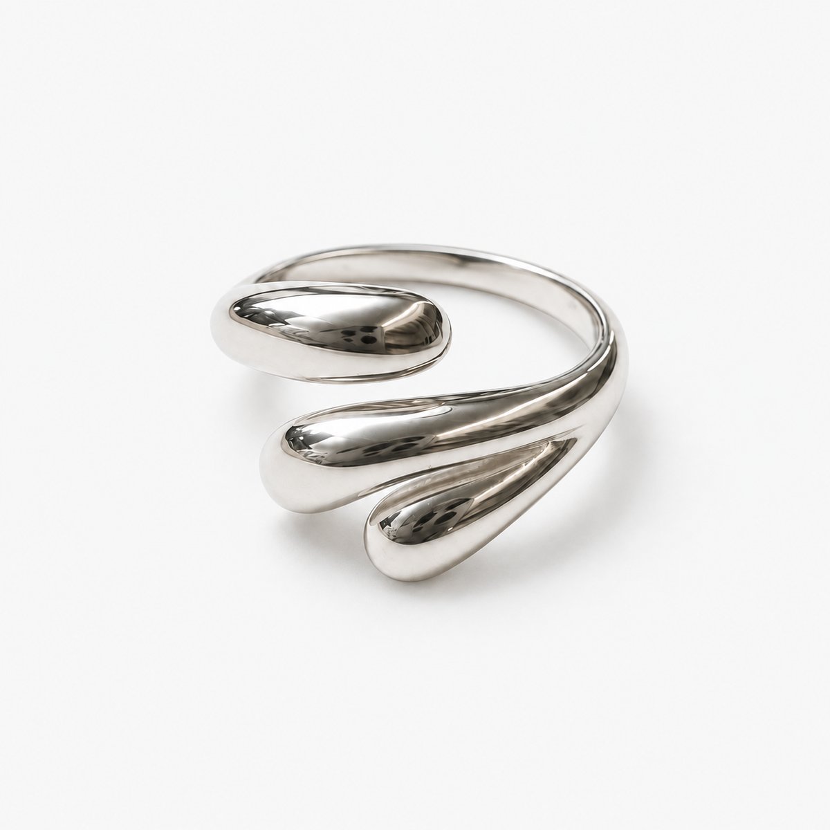 Hushed Orbit Ring — light neutral background with natural shadow