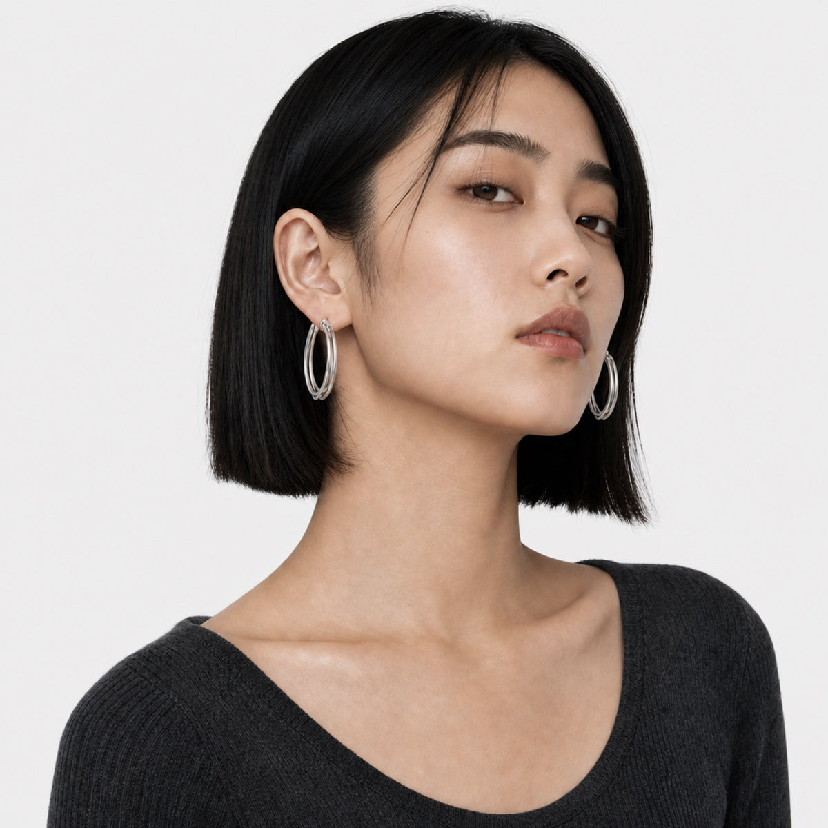 Silver Oval Hoops corrected model wearing image one