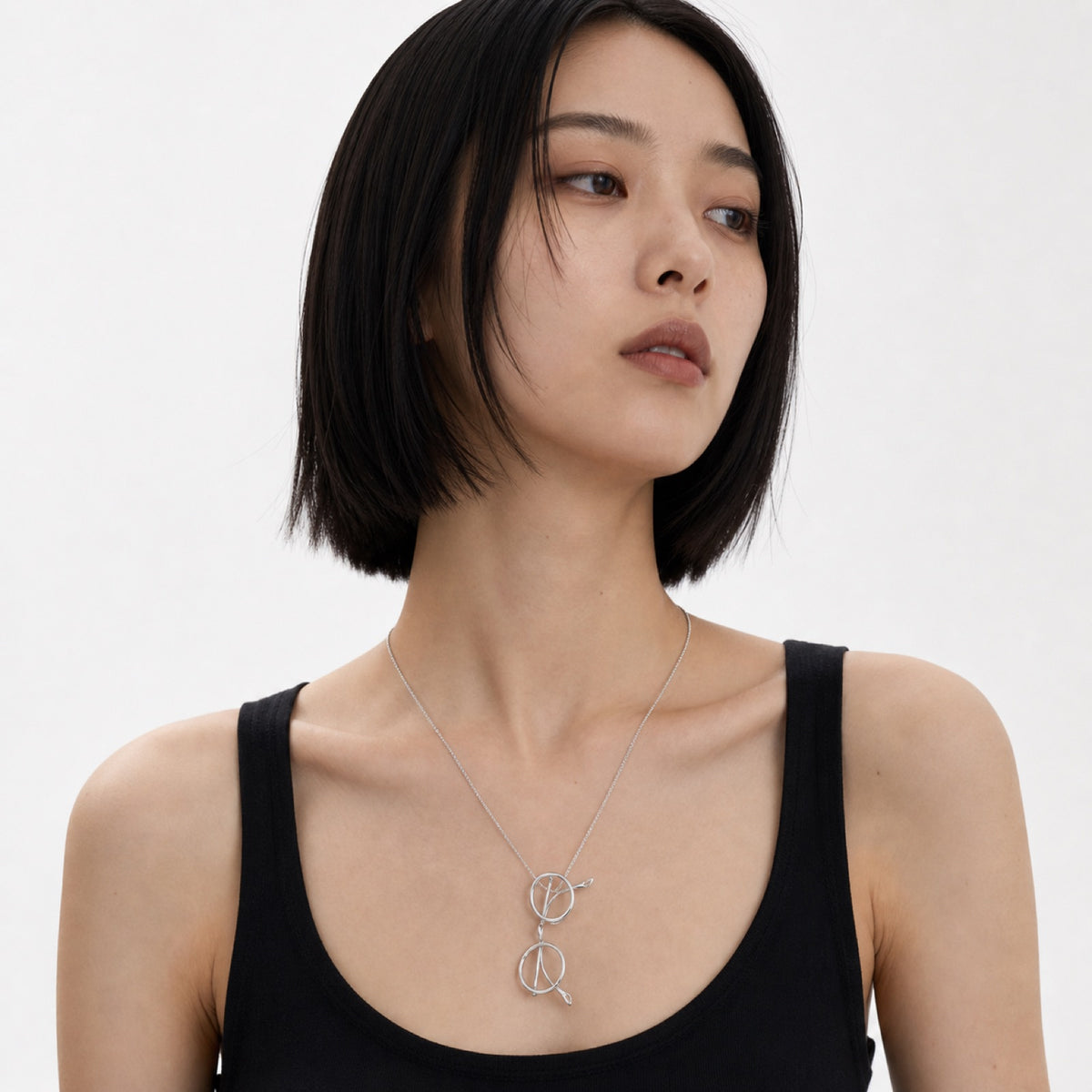 Double Loop Leaf Necklace model wearing image one