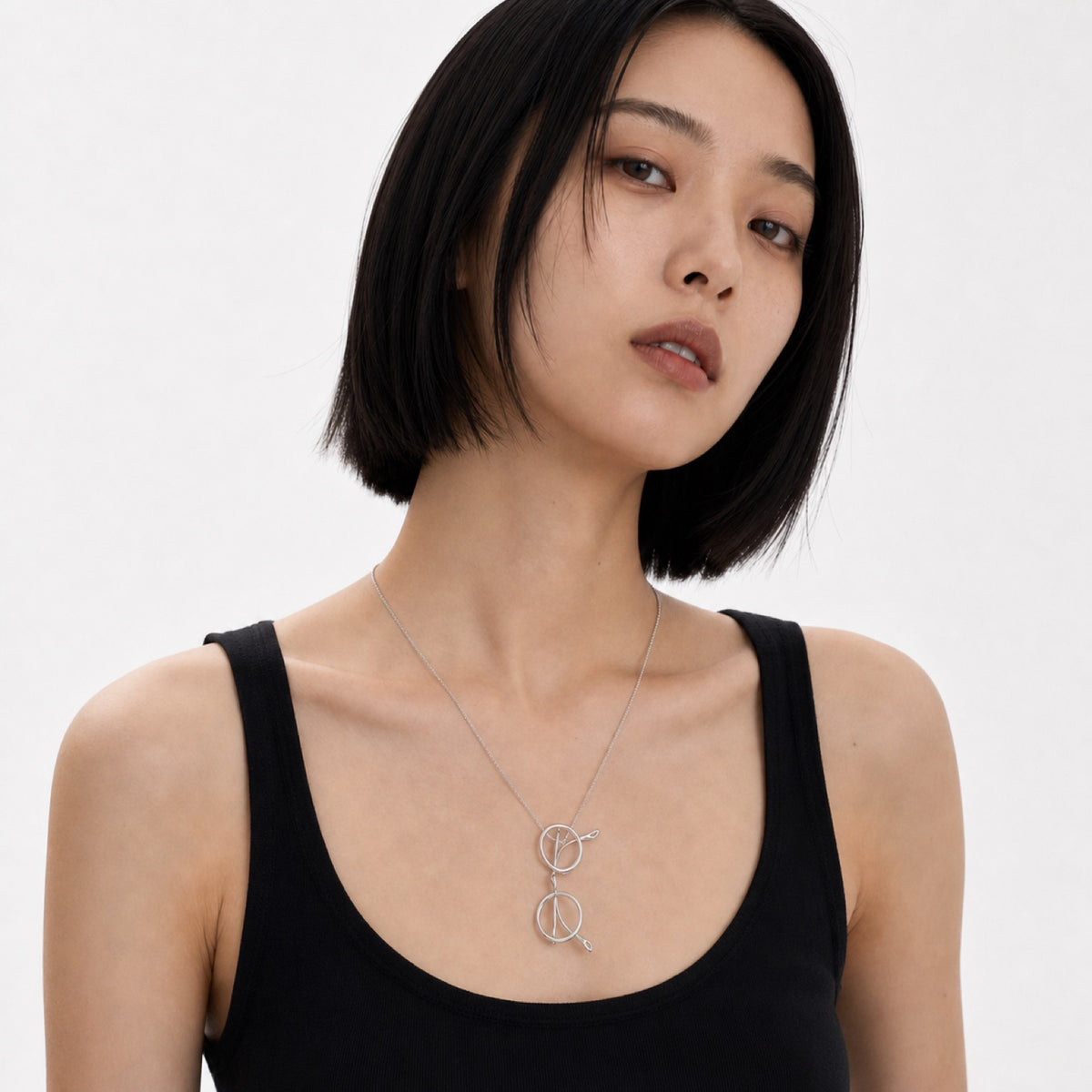 Double Loop Leaf Necklace model wearing image two