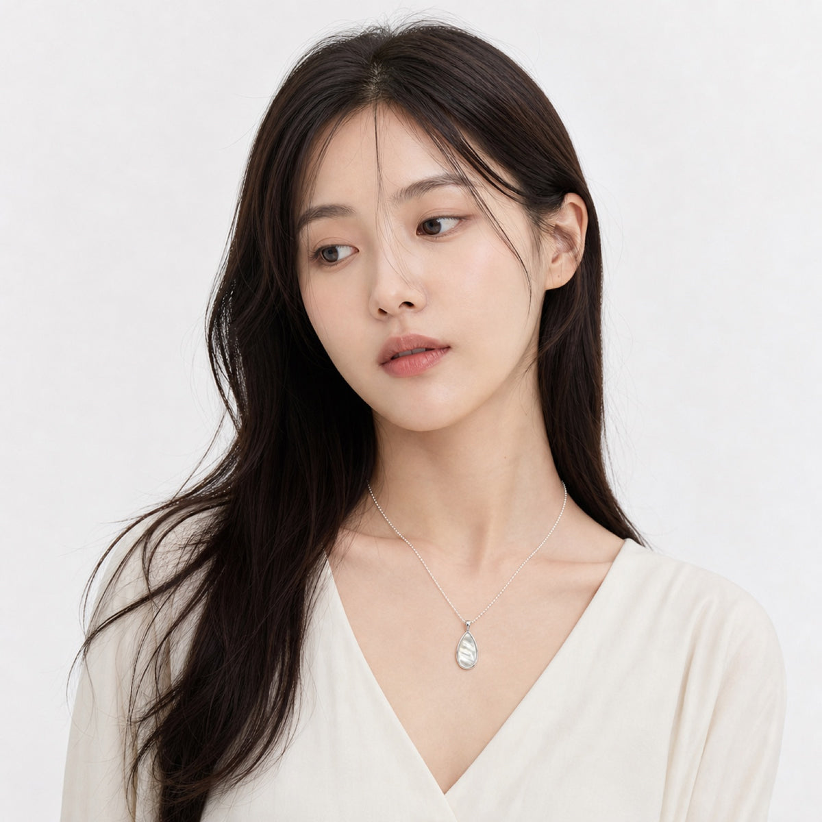 Silver Leaf Drop Necklace model wearing image one