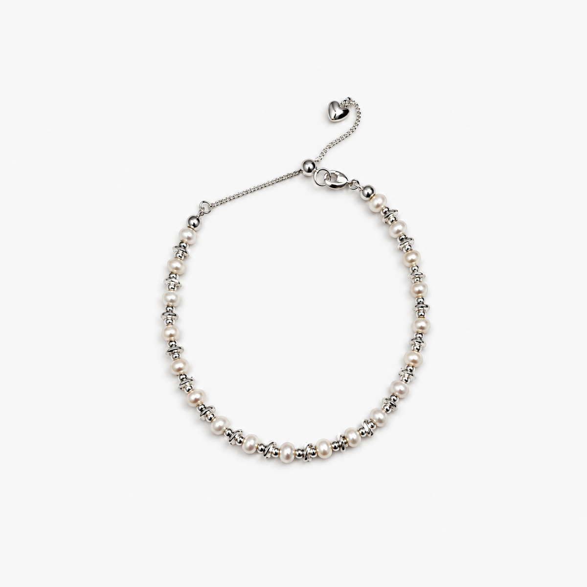 MUTESCENE Pearl Silver Bead Bracelet on a light neutral background