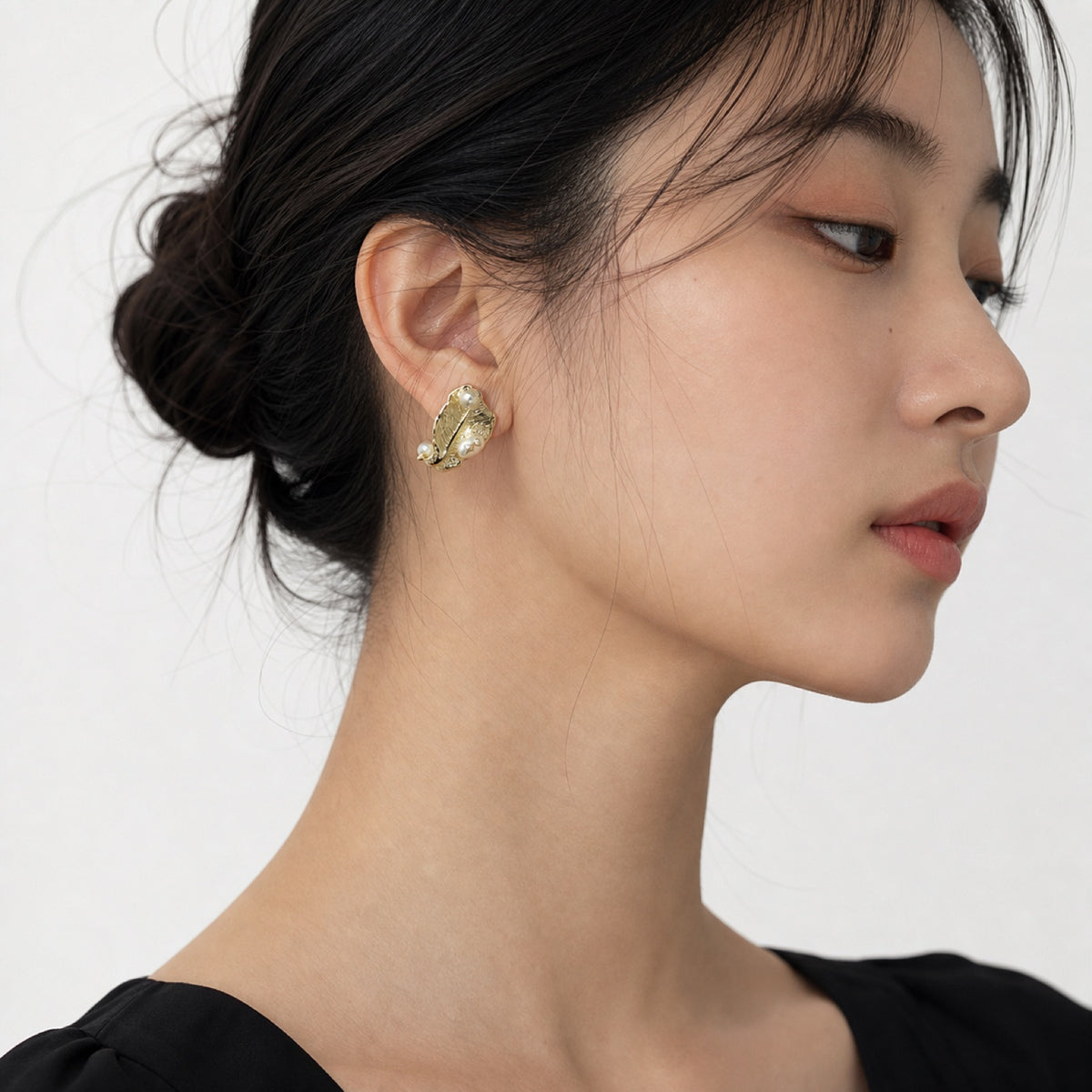 Golden Leaf Pearl Earrings model wearing image two