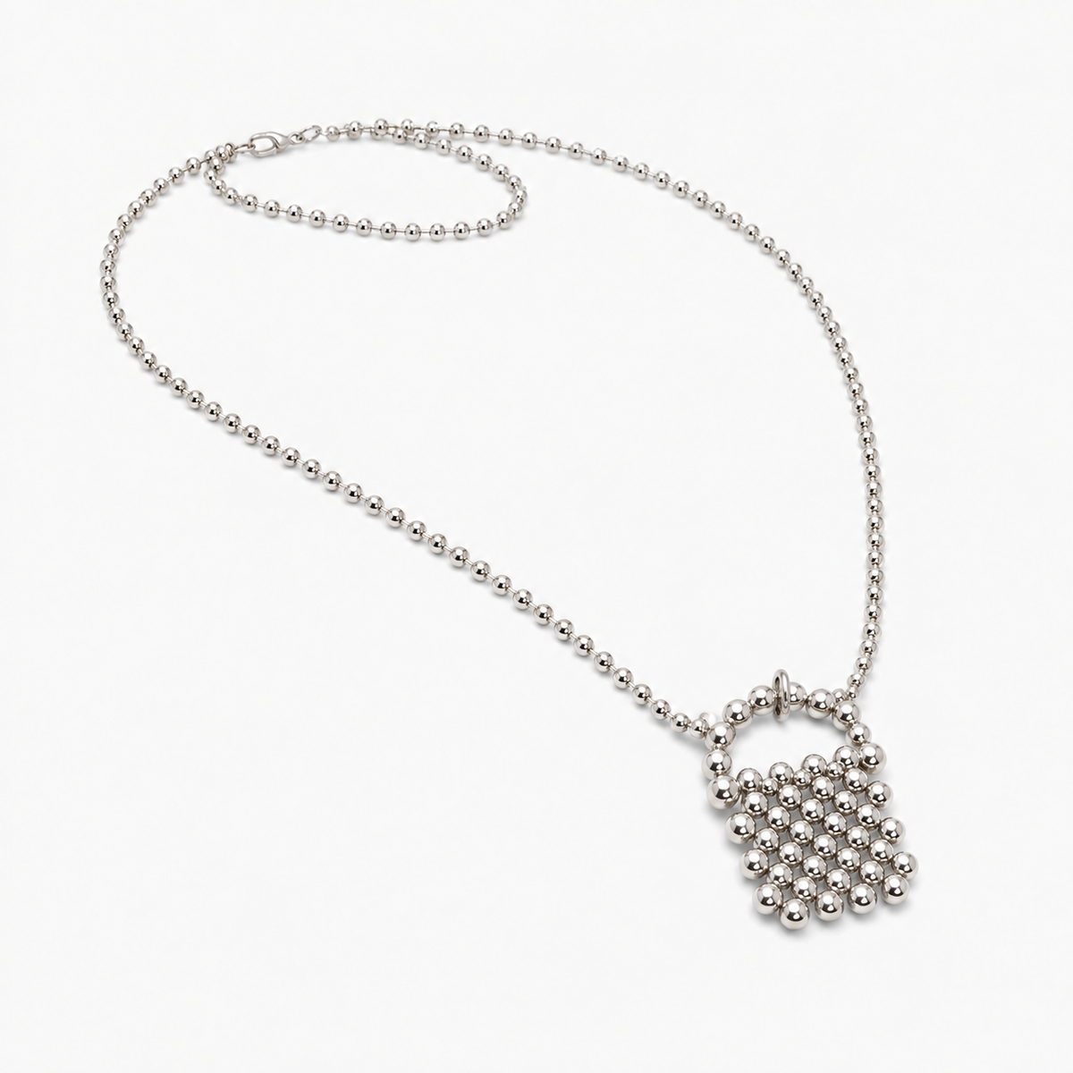Stardust Pendant Necklace detail showing the silver jump ring connection