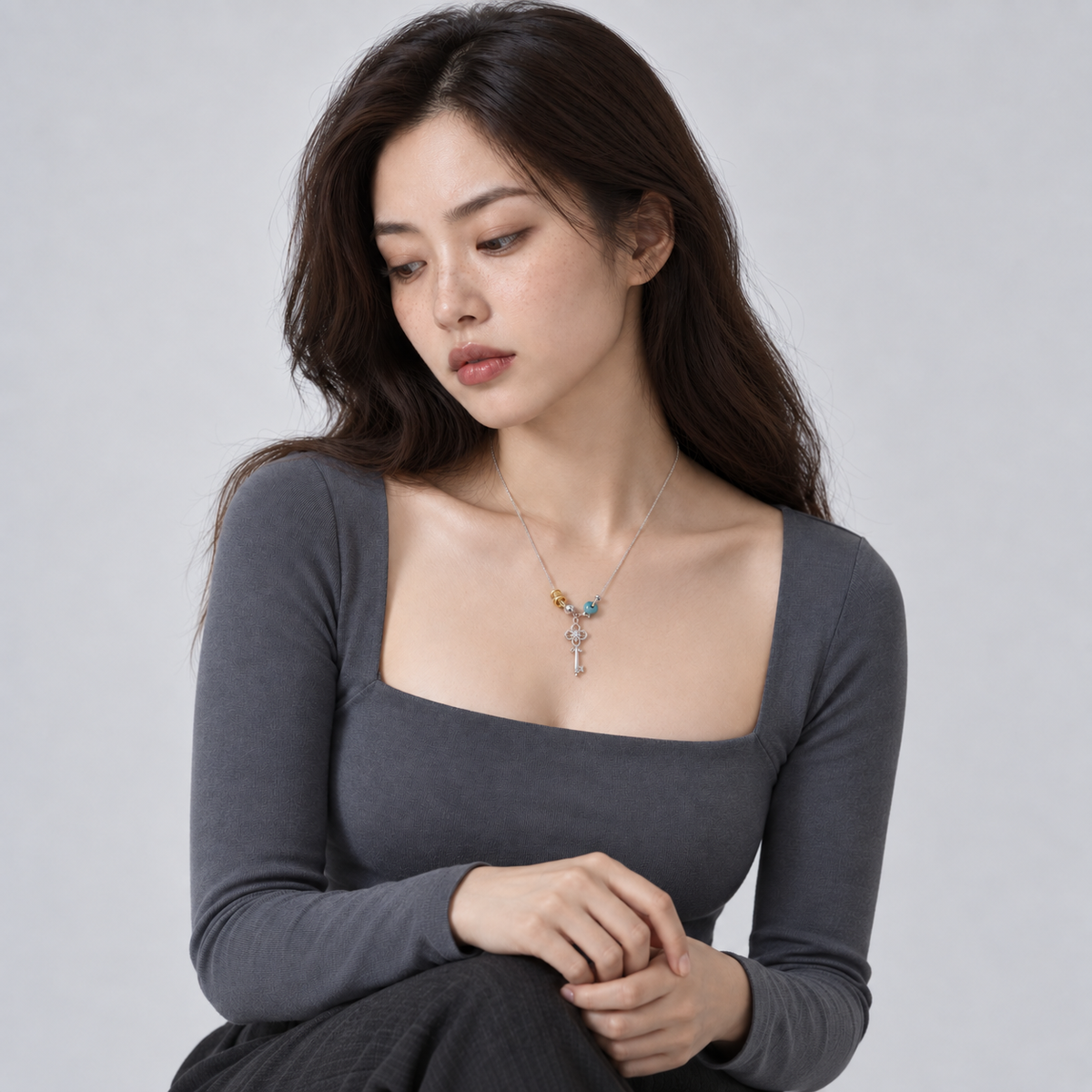 Azure Key Necklace — model editorial