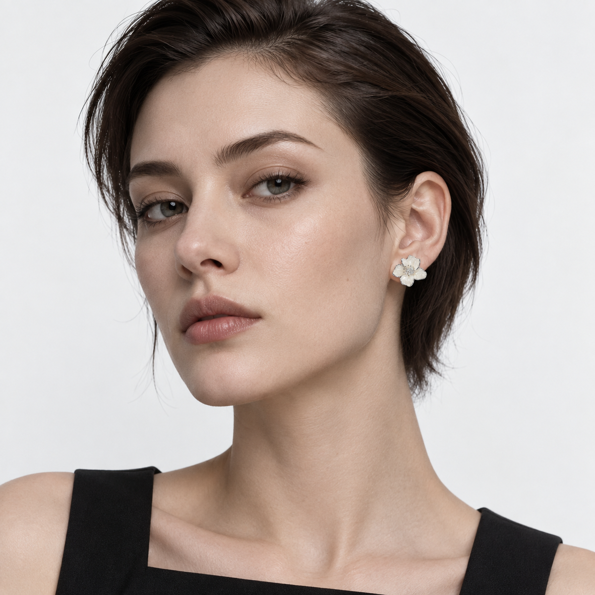 Pearl Veil Flower Studs — model wearing view 1